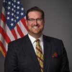 Andrew D Brown
